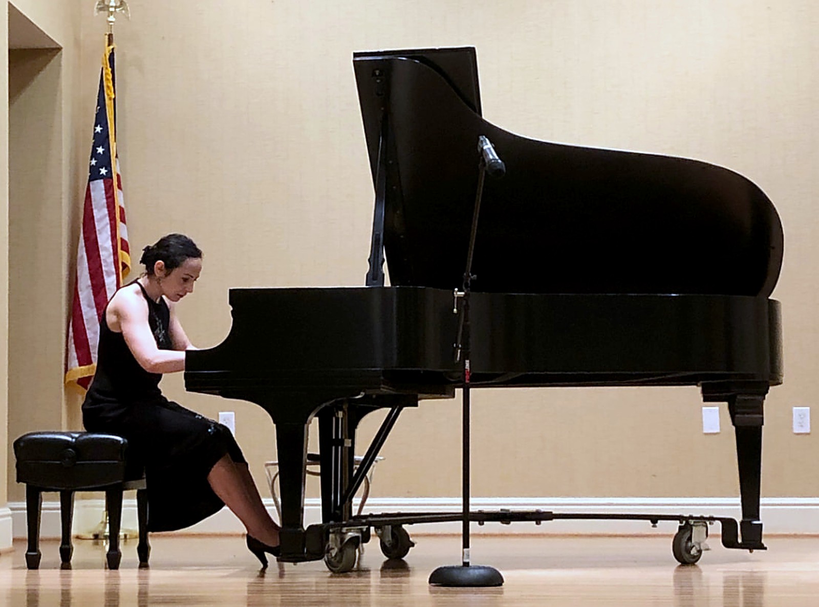 Dr. Monique Arar performing at the piano